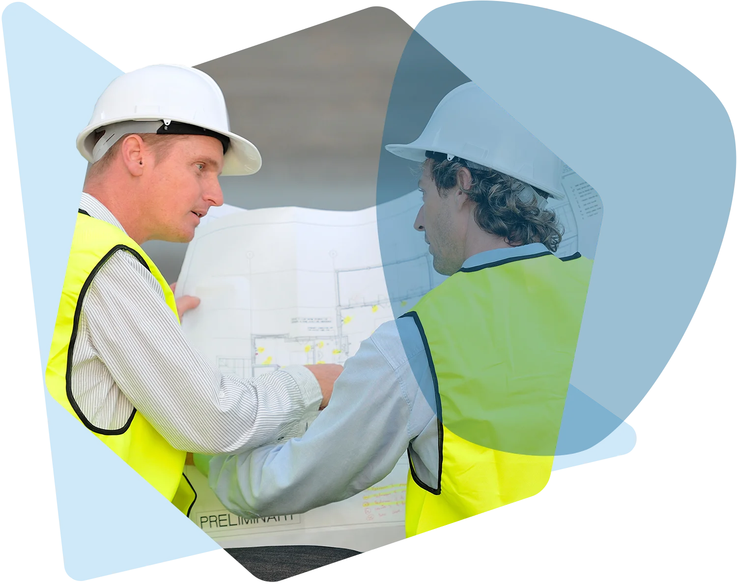 government contractors looking at blueprints on a job site